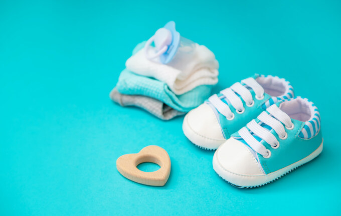 baby accessories for newborns on a colored background. selective focus.